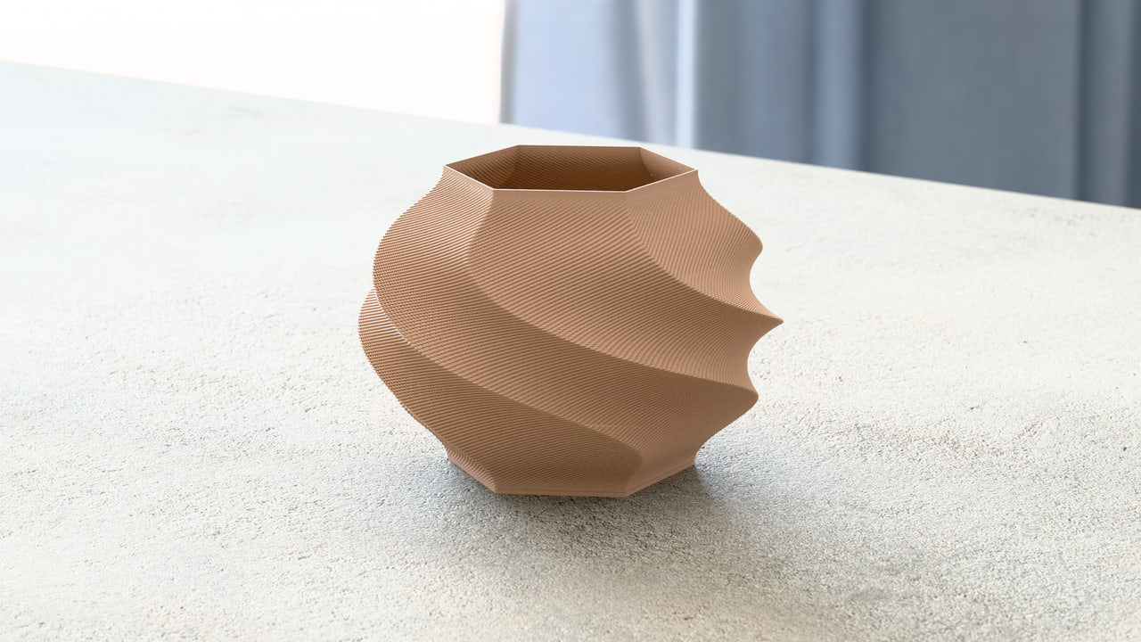 The Gelato lamp in PLA Matte Latte Brown in the concrete desk set, under office daylight light.
