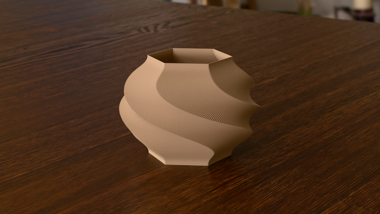 The Gelato lamp in PLA Matte Latte Brown in the wood table set, under workshop daylight light.